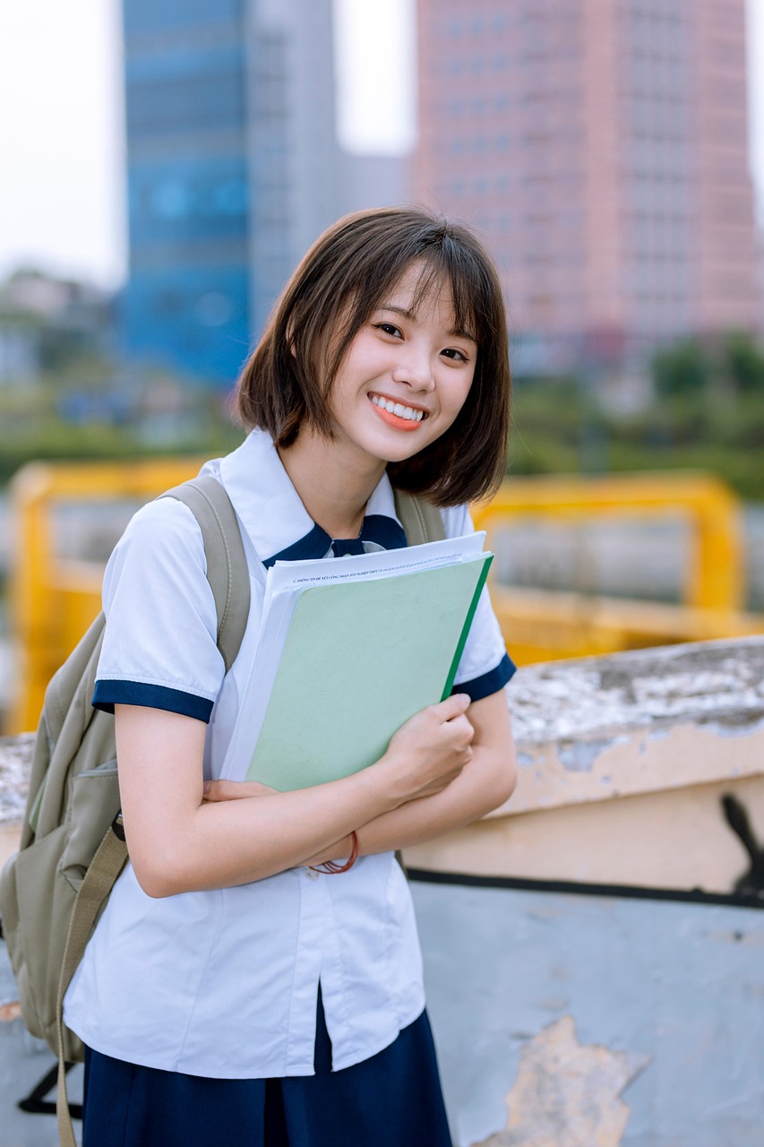 Early Signs of Teen Scoliosis girl, student, smile, happy, young woman, teen, teenager, school girl, uniform, school uniform, pose, portrait, student, student, student, student, student